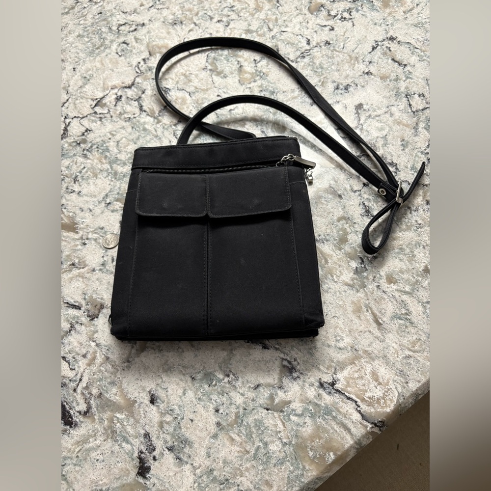 Unbranded black crossbody bag with adjustable strap
